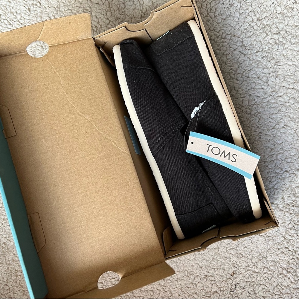 TOMS Classic Black Canvas Slip-Ons